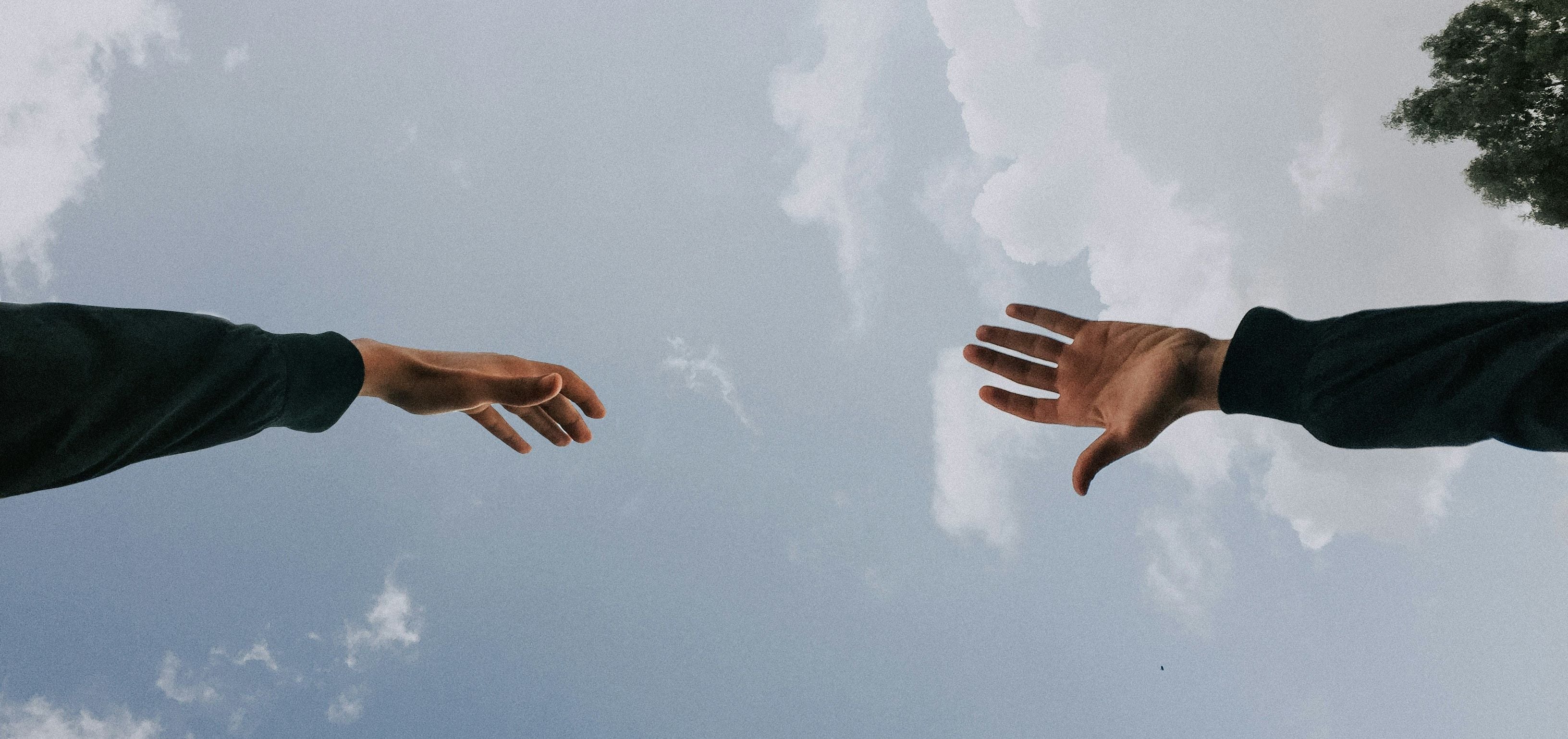 Hands reaching out